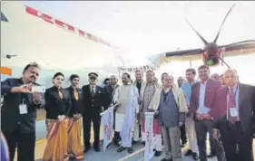  ?? DIWAKAR PRASAD/HT ?? ■ Chief minister Raghubar Das along with Union civil aviation minister Jayant Sinha and others flagging off the newly introduced flight service at Birsa Munda Airport in Ranchi on Friday .