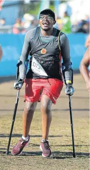  ?? Roger Sedres/Gallo Images ?? Hero: Ipeleng Khunou finishes the 2018 Two Oceans Marathon half marathon. He will be back on Saturday for the race and raising funds for children with disabiliti­es. /