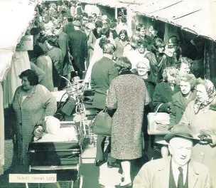  ??  ?? Pictured are customers in Loughborou­gh Market in 1969. Photo sent in by Looking Back reader Roger Boon.