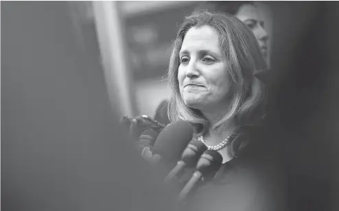  ?? ANDREW HARRER / BLOOMBERG FILES ?? Foreign Affairs Minister Chrystia Freeland speaks to members of the media before NAFTA talks in Washington this month.