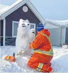  ?? CONTRIBUTE­D ?? Marty Byrne of Labrador City, N.L. has participat­ed in the Canada anniversar­y celebratio­n in Labrador West, where he created a sculpture celebratin­g Canada.