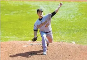  ?? ADRIAN KRAUS/AP ?? Orioles starting pitcher Keegan Akin throws to a Toronto Blue Jays batter Monday during the first inning of game in Buffalo, N.Y.