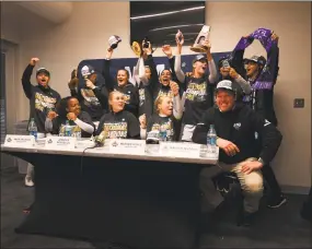  ?? University of Bridgeport ?? The University of Bridgeport soccer team celebrates a national title during the post-match press conference