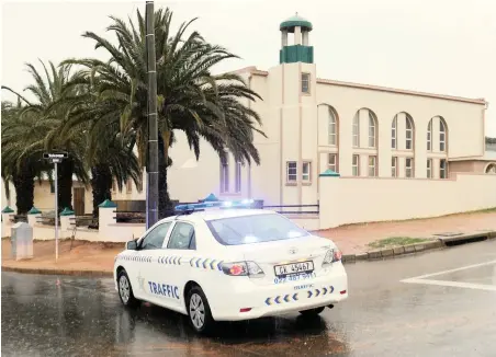  ?? PICTURE: HENK KRUGER/AFRICAN NEWS AGENCY (ANA) ?? ON PATROL: The Malmesbury mosque where two worshipper­s were killed.