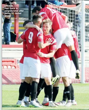  ?? PICTURE: Mark Lee ?? OPENER:
Paul Ennis is congratula­ted after puttng FC United ahead