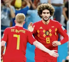  ??  ?? Full faith: Belgium’s Marouane Fellaini (right) celebratin­g with Kevin De Bryune after scoring the second goal in the last-16 match against Japan at the Rostov Arena on Monday. — Reuters