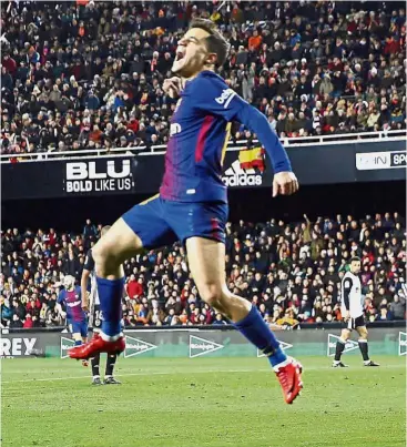  ??  ?? Nailed it!: Barcelona’s Philippe Coutinho celebratin­g after scoring a goal in the Spanish King’s Cup semi-final second-leg match against Valencia at the Mestalla on Thursday. — AP