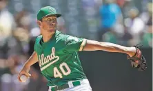  ?? Ben Margot / Associated Press ?? A’s pitcher Chris Bassitt mixed in about 15 changeups while throwing six scoreless innings in Saturday’s win.