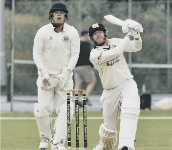  ??  ?? Mark Edwards batting for Peterborou­gh Town against Cambridge CC last weekend. Photo: David Lowndes.