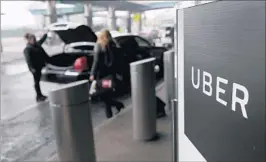  ?? SETH WENIG/AP ?? Uber has fired 20 employees because of findings related to a report on workplace culture there. Tuesday’s report to employees will include investigat­ors’ recommenda­tions.