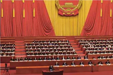  ?? PIC AFP ?? Chinese Premier Li Keqiang delivering his work report at the opening session of the National People’s Congress, China’s legislatur­e, at Beijing’s Great Hall of the People yesterday.