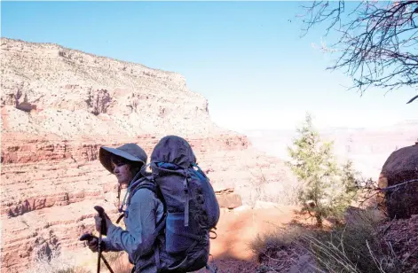 ??  ?? Kai pauses while hiking the Hermit Trail in the Grand Canyon, his first backpackin­g trip.