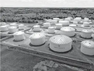  ?? REUTERS ?? Holding tanks are seen in an aerial photograph at Colonial Pipeline’s Dorsey Junction Station in Woodbine, Md., on Monday.