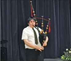  ?? 01_A13concert­08 ?? Ross Kerr was the only entry in the piping solo advanced class.