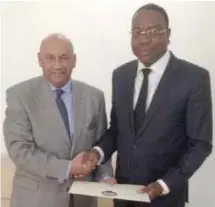  ??  ?? DAKAR: Kuwait’s newly appointed Ambassador to Senegal Saleh Al-Saqabi submits his credential­s to Senegal’s Foreign Minister Mankeur Ndiaye.