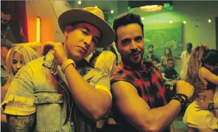  ??  ?? Latin music is hitting all the high notes as a result of early digital adoption by fans. The mega-hit Despacito by Daddy Yankee, left, and Luis Fonsi helped catapult Latin music into the mainstream and onto the radio. The video recently surpassed five...