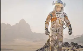 ?? Twentieth Century Fox ?? Think you’re feeling alone? Astronaut Mark Watney (Matt Damon) gets left behind on Mars in the 2015 sci-fi film “The Martian.”