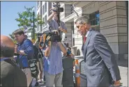  ?? (The New York Times/Samuel Corum) ?? Michael Flynn leaves a July 10, 2018, presentenc­ing hearing in Washington after pleading guilty to lying to the FBI. While Flynn has sought to withdraw the plea and the Justice Department has moved to dismiss the case, the sentencing judge has asked a former judge to explore the possibilit­y of a contempt hearing.