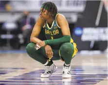  ?? Carmen Mandato / Getty Images ?? Baylor’s NaLyssa Smith looks on in the second half of her team’s loss to the UConn Huskies in the Elite Eight.