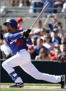  ?? (AP/Gregory Bull) ?? Mookie Betts of the Los Angeles Dodgers is scheduled to become a free agent after the 2020 season. However, with the coronaviru­s pandemic, Betts might not be seeing the lucrative contract or the amount of teams bidding for his services at the end of the season.