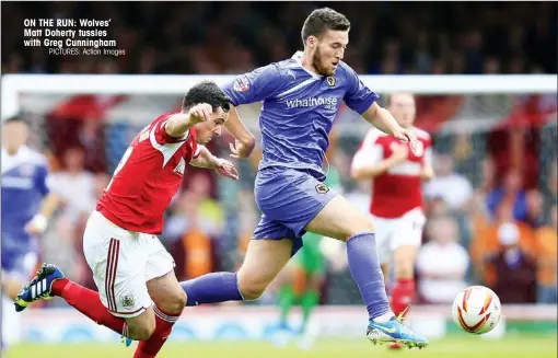  ?? PICTURES: Action Images ?? ON THE RUN: Wolves’ Matt Doherty tussles with Greg Cunningham