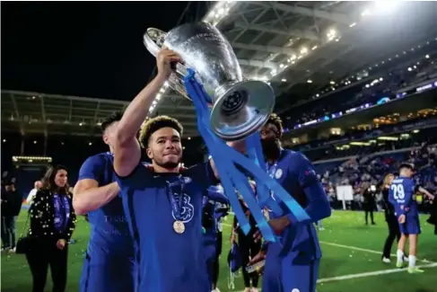  ?? (Getty) ?? Reece James lifts the Champions League trophy