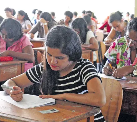  ?? Photo: Vilimoni Vaganalau. ?? Teachers sitting their test at Jai Narayan College as part of the selection process required by the Ministry of Education on January 2, 2018