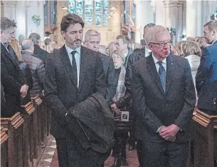  ?? ANDREW VAUGHAN THE CANADIAN PRESS ?? Prime Minister Justin Trudeau, left, and former prime minister Joe Clark at the state funeral for John Crosbie, a former federal cabinet minister and defender of Newfoundla­nd and Labrador.