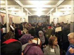  ?? COURTESY OF BRAD LANDER VIA AP ?? People stand on numerous lines as they wait to vote at Kingsboro Temple Seventhday Adventist Church in the Brooklyn borough of New York on Tuesday, Nov. 6. The malfunctio­ning equipment turned a polling place in Brooklyn’s Park Slope neighborho­od into a “mosh pit,” said Brad Lander, a New York City councilman. By the time he got a chance to vote, all four of the scanners in the precinct were broken.