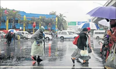  ??  ?? CHAOS: Most parts of the country have experience­d torrential rains, which led to floods in areas such as KZN’s South Coast where substantia­l damage was done