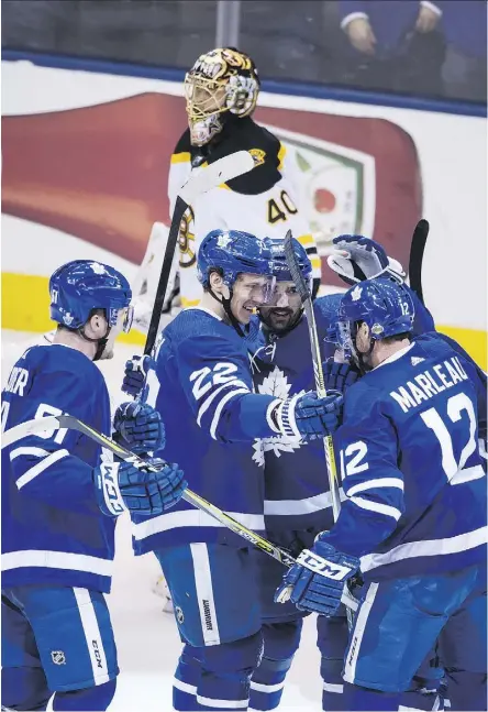  ?? PHOTOS: PETER J. THOMPSON ?? Toronto Maple Leaf Tomas Plekanec, centre, celebrates an open-net goal in a 3-1 win over the Boston Bruins as Bruins goalie Tuukka Rask skates by in the background in the third period of Game 6 of their first round series at Toronto’s Air Canada Centre...