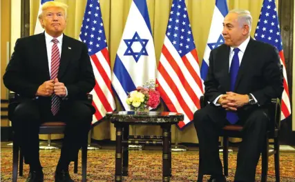  ?? JONATHAN ERNST | AFP ?? Presidente dos EUA Donald Trump junto com o primeiro-ministro de Israel em Jerusalém reafirma compromiss­o com a paz na região