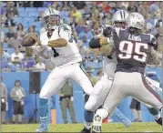  ?? BoB lEvEronE / AssoCiATED prEss ?? Carolina quarterbac­k Cam newton had a rough game in Friday night’s loss to the new England patriots, going 13 for 29 with two intercepti­ons and no touchdown passes.