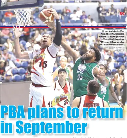  ?? PBA MEDIA BUREAU PHOTO ?? June Mar Fajardo of San Miguel Beer (No. 15) grabs a rebound against Khapri Alston of Columbian Dyip during a PBA Season 44 Governor’s Cup game at the Araneta Coliseum.