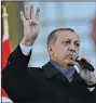  ?? AP/BURHAN OZBILICI ?? Turkish President Recep Tayyip Erdogan speaks to supporters Monday during a rally outside the presidenti­al palace in Ankara.