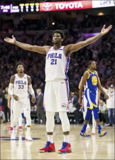  ?? CHRIS SZAGOLA — THE ASSOCIATED PRESS ?? Joel Embiid and the Sixers have 24 nationally televised games this upcoming season, including a home contest against the Bucks on Christmas Day.