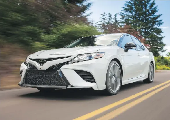  ??  ?? The all-new Toyota Camry offers bold styling, improved fuel efficiency, standard safety equipment, and advanced in-vehicle connectivi­ty services.