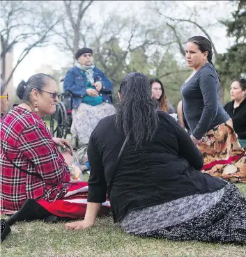  ?? KAYLE NEIS/FILES ?? Cheryl James, left, organized a smudge in honour of her sister Kinew James, who died on Jan. 20, 2013 after she was found unresponsi­ve in her cell at the Regional Psychiatri­c Centre.