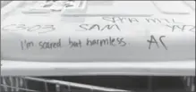  ?? DAVID BEBEE, RECORD STAFF ?? The message “I’m scared but harmless” is written on a Humane Society Internatio­nal travel crate on Tuesday.