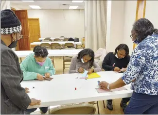  ?? Submitted Photo ?? The Eureka Boys and Girls Club recently held its monthly meeting during which sponsor Wilma Johnson, right, taught members to sew. Club members, seated from left, are: Kriston Hawkins, Rheagan Watson and Adaia Hicks. Eva Pickett and Elizabeth NcNutt are also club sponsors.