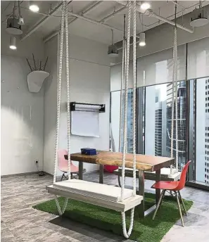  ?? — Photos: ST ?? Furniture in Danone’s Singapore office gives a mix of a homey feel and a funky vibe designed to prompt creativity.