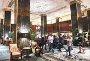  ?? TIMOTHY A. CLARY / AGENCE FRANCE-PRESSE ?? The main lobby of New York Waldorf Astoria, which has hosted a stream of celebritie­s, politician­s and business leaders since it opened in 1931.