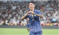  ?? ?? Argentina’s midfielder Angel Di Maria celebrates after scoring during the friendly against United Arab Emirates at the Mohammed Bin Zayed Stadium in Abu Dhabi on Wednesday.