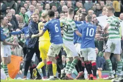  ??  ?? OLD FEUD
Rangers and Celtic have rival fans frothing at mouth