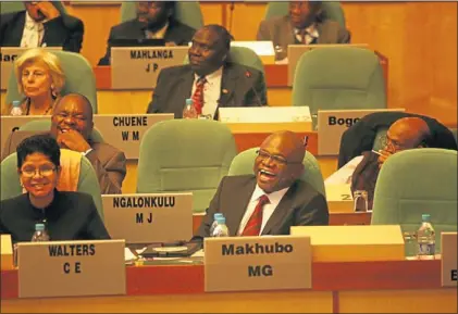  ?? PHOTO: MOHAU MOFOKENG ?? UNPERTURBE­D: Geoffrey Makhubo has a light moment as MMC for environmen­t and infrastruc­ture in the City of Johannesbu­rg Matshidiso Mfikoe delivers her budget speech