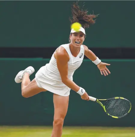  ?? Picture: GETTY IMAGES ?? Johanna Konta serves during her Wimbledon quarter-final match against Simona Halep.