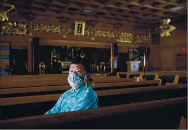  ?? DAI SUGANO —STAFF PHOTOGRAPH­ER ?? The Rev. Gerald Sakamoto, of the San Jose Buddhist Church Betsuin, poses for a portrait on Tuesday. The church remains closed to the public to comply with Gov. Gavin Newsom’s announceme­nt to roll back some reopenings.