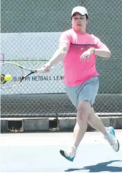  ??  ?? Brendan Tang lines up a forehand smash during the Riverside tennis match between Neerim District and Trafalgar.