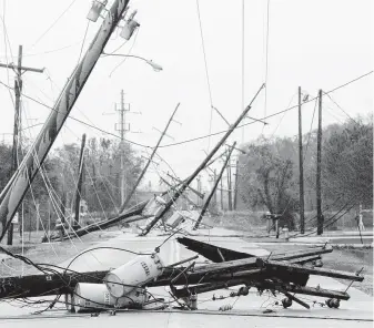  ?? Tony Gutierrez / Associated Press file ?? Hurricane Ike left a mess in Beaumont in September 2008. Many policyhold­ers along the Texas coast are upset about TWIA’s 10 percent rate increase.