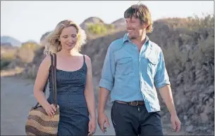  ??  ?? During a Greek vacation, Celine (Julie Delpy) and Jesse (Ethan Hawke) attempt to address the nagging concerns about their relationsh­ip in “Before Midnight.”